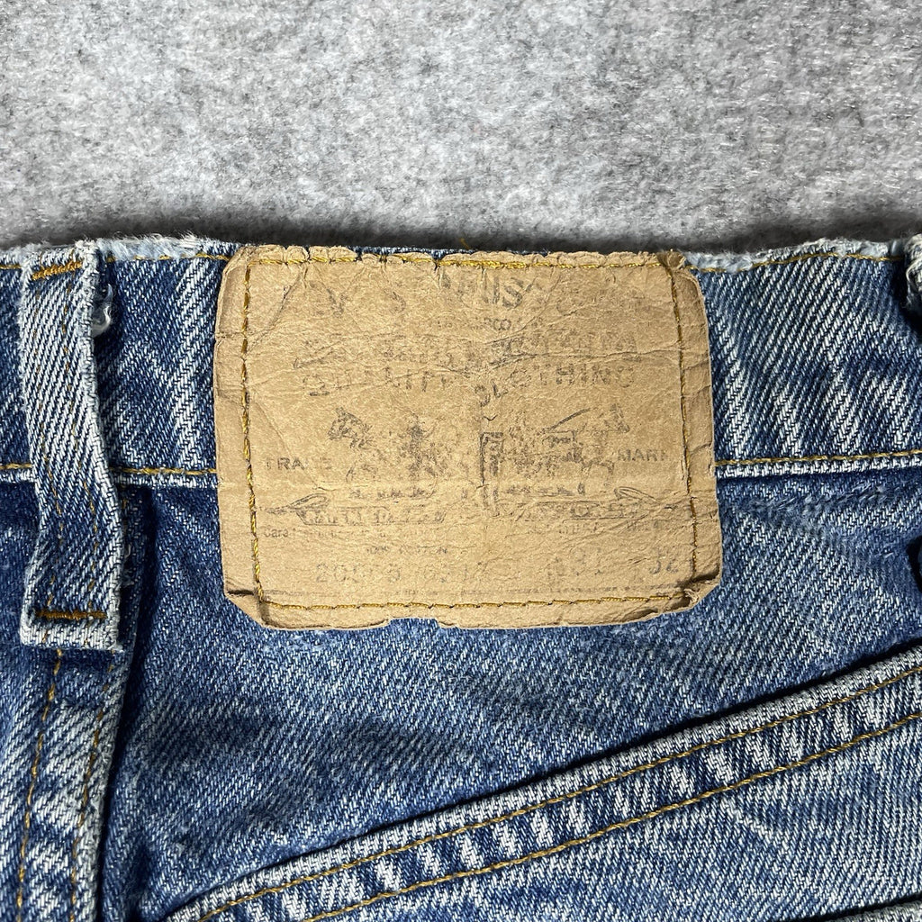 Levi's 505 Orange Tab Jeans, Medium Wash Distressed Denim
