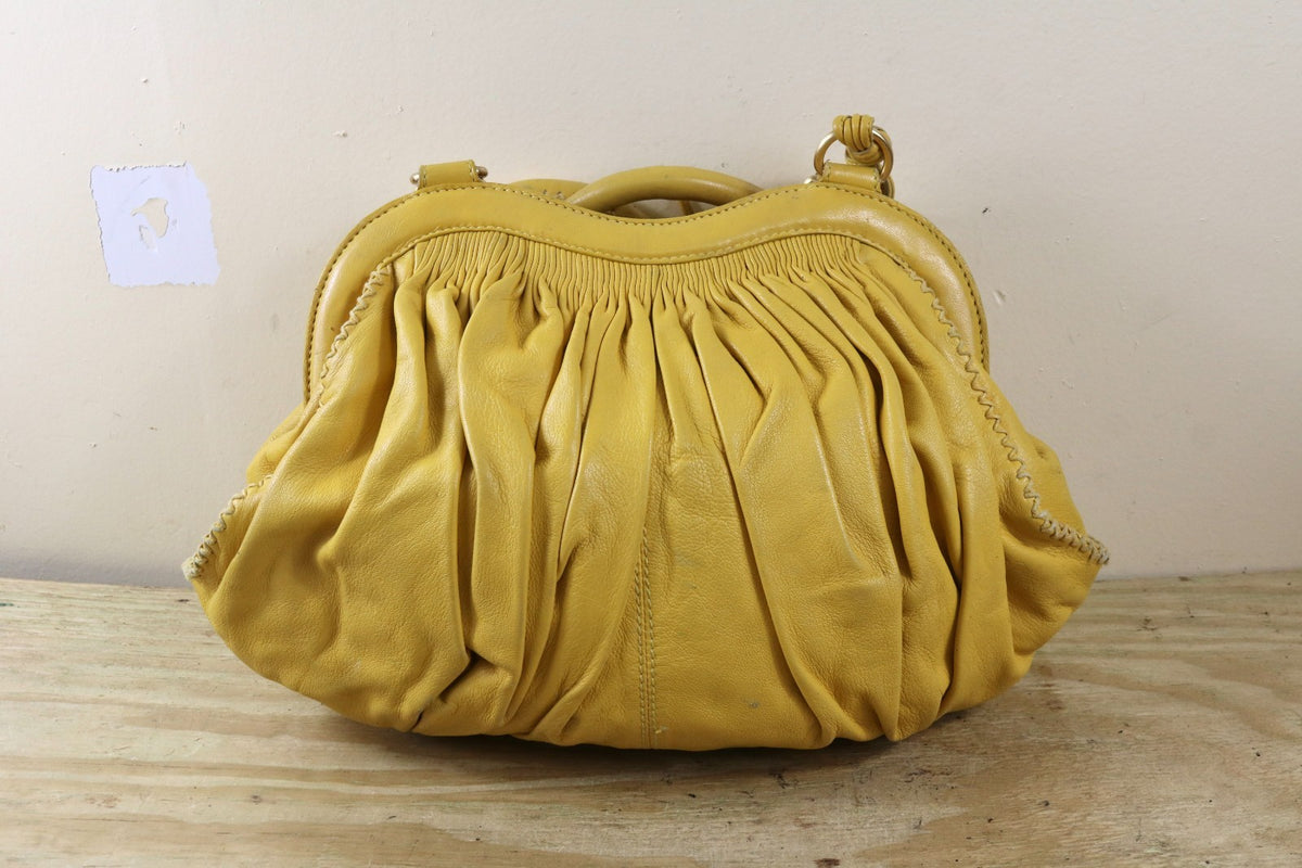Isabella Fiore Large Yellow Leather Whipstitch Tassel Hobo