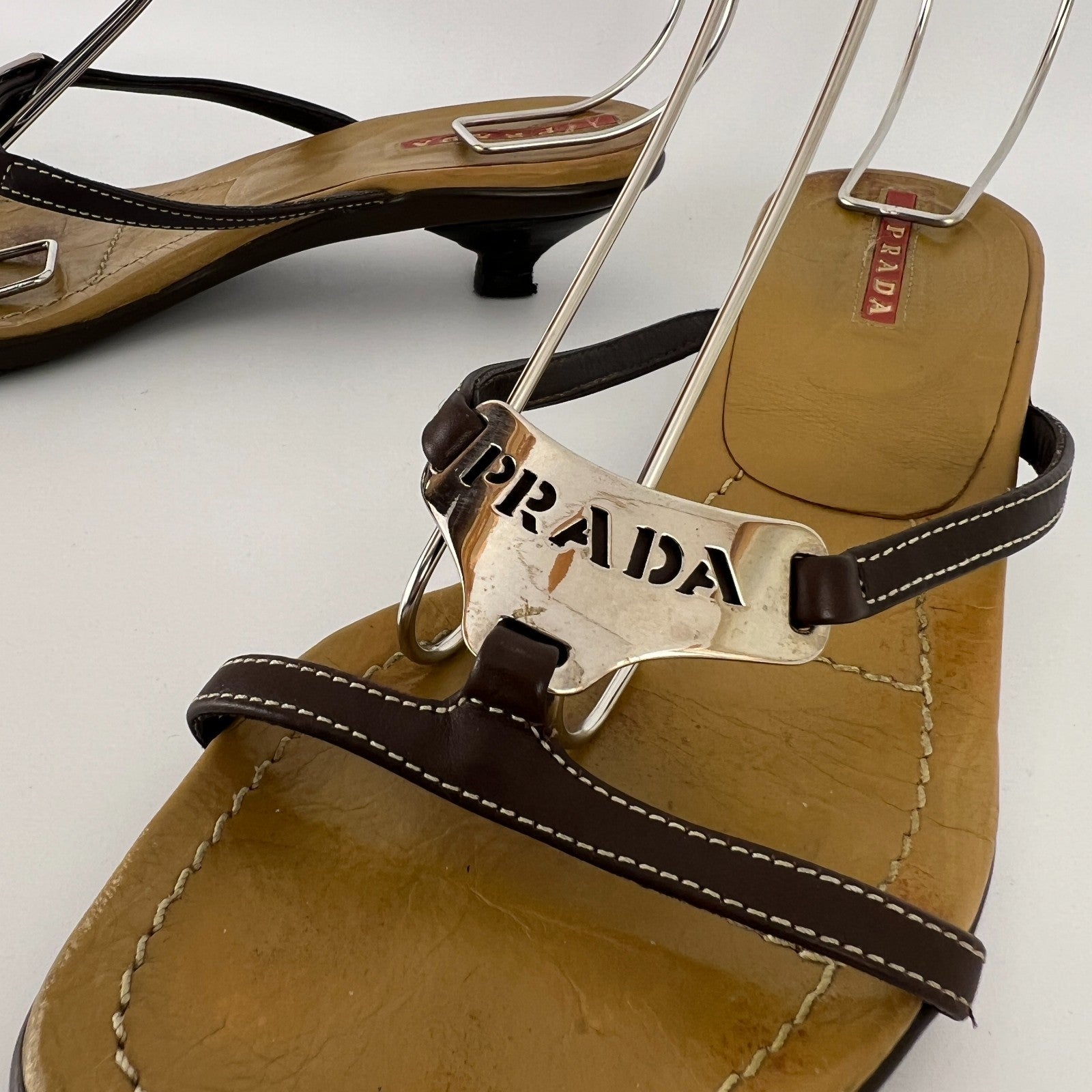 Prada | Auth Brown Leather Silver Logo Buckle Kitten Sandal Heels (34.5)