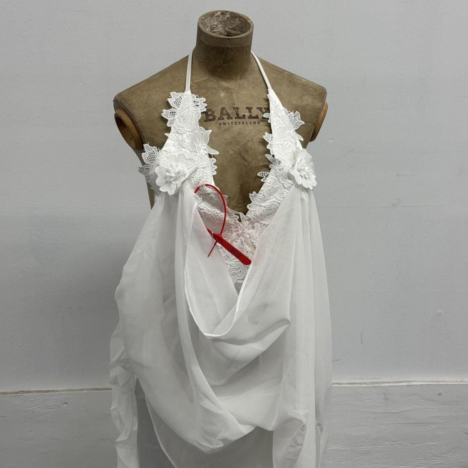 White Sculptural Halter Gown with Cascading Chiffon