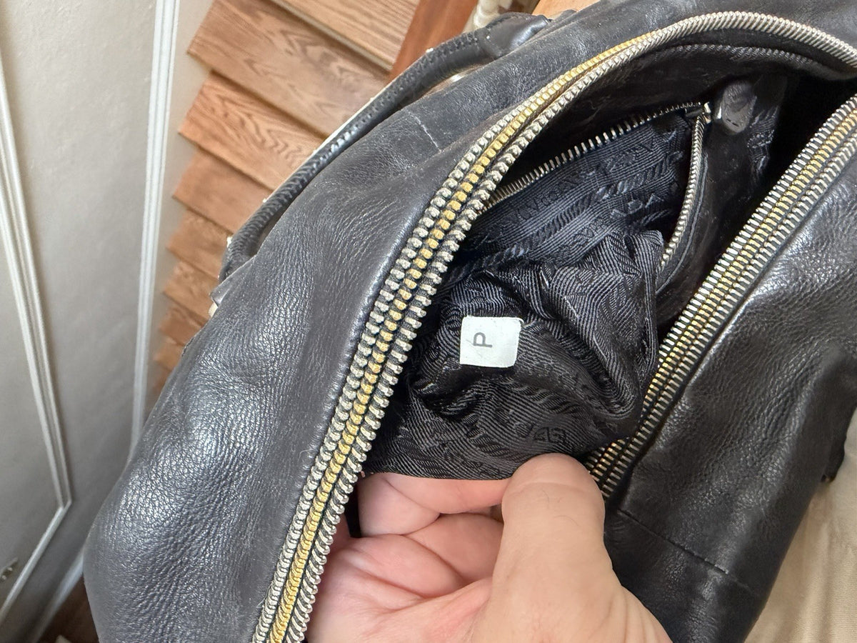 Prada Black Top Handle Bag with Gold Hardware