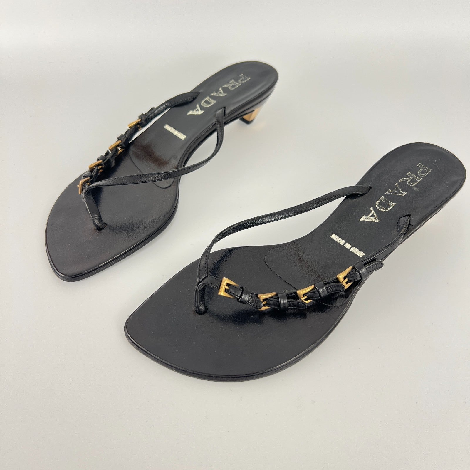 Prada | Auth Vintage Black Leather Gold Buckle Thong Kitten Heels (34.5)