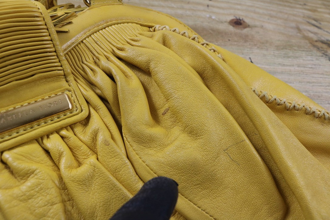 Isabella Fiore Large Yellow Leather Whipstitch Tassel Hobo