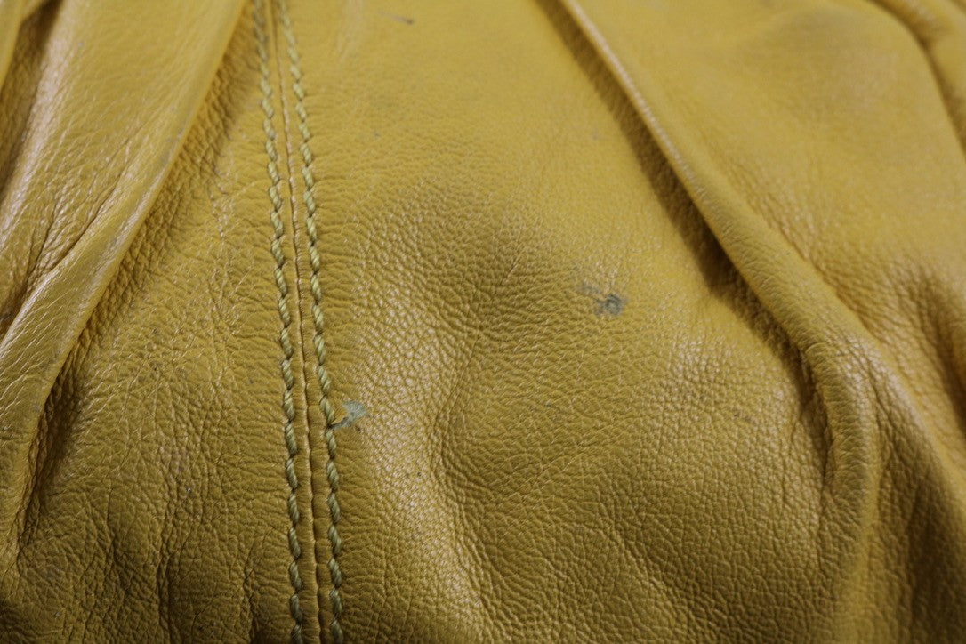 Isabella Fiore Large Yellow Leather Whipstitch Tassel Hobo