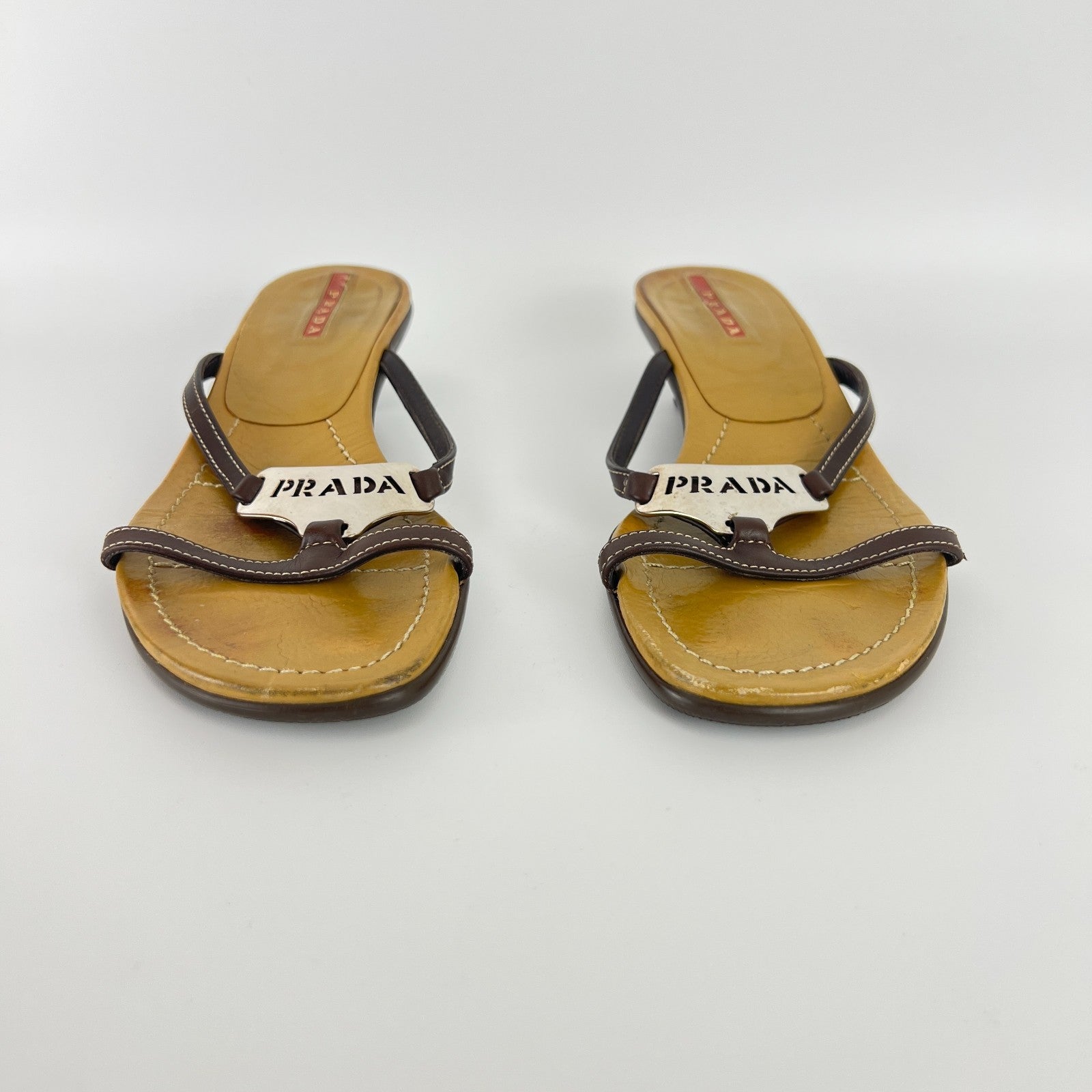 Prada | Auth Brown Leather Silver Logo Buckle Kitten Sandal Heels (34.5)