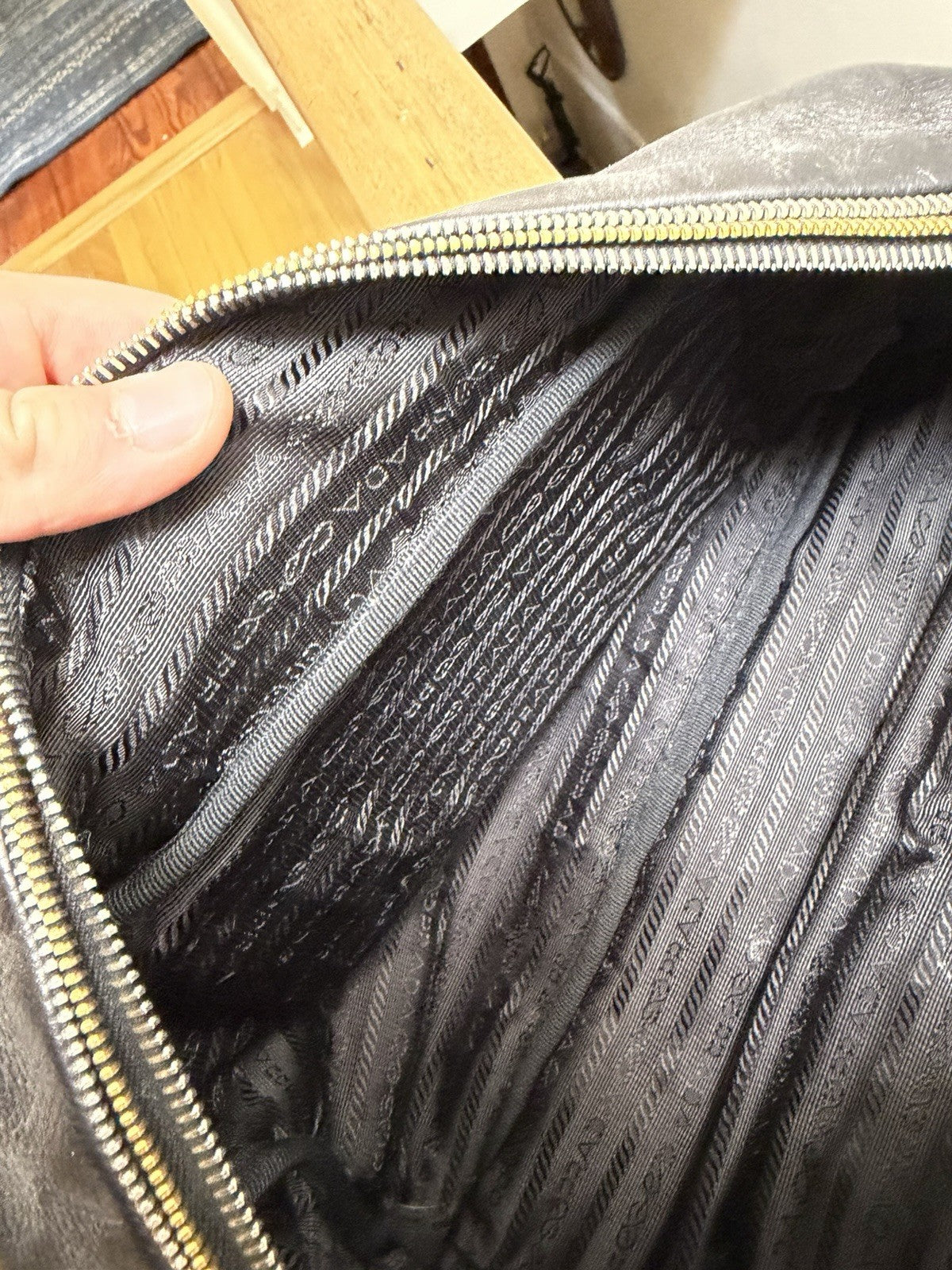 Prada Black Top Handle Bag with Gold Hardware