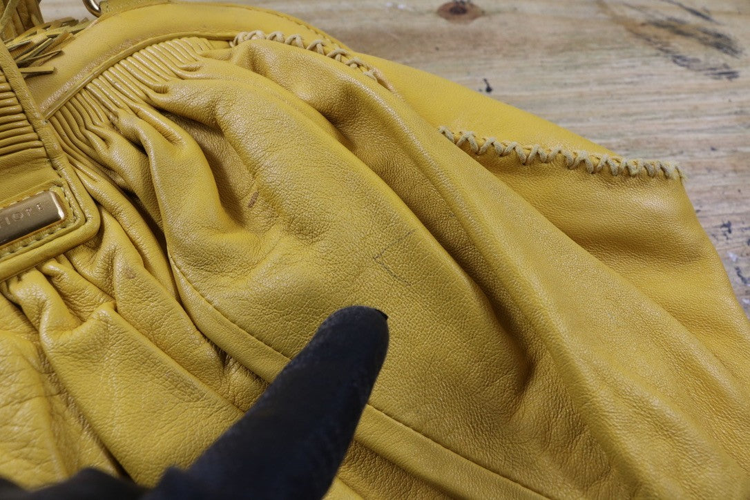 Isabella Fiore Large Yellow Leather Whipstitch Tassel Hobo